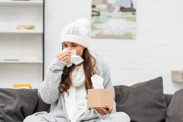 Sick Young Woman Warm Clothes Blowing Nose Paper Napkin Home — Stock Photo, Image