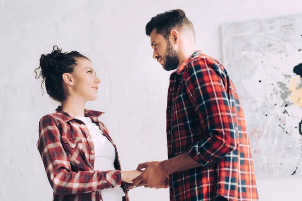 Low Angle View Man Holding Hands Girlfriend Checkered Shirt Home — Free Stock Photo