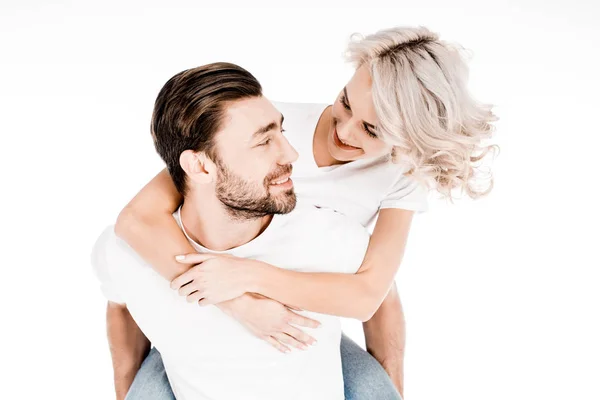 Handsome Young Adult Man Giving Piggyback Wonderful Blonde Woman Isolated — Free Stock Photo