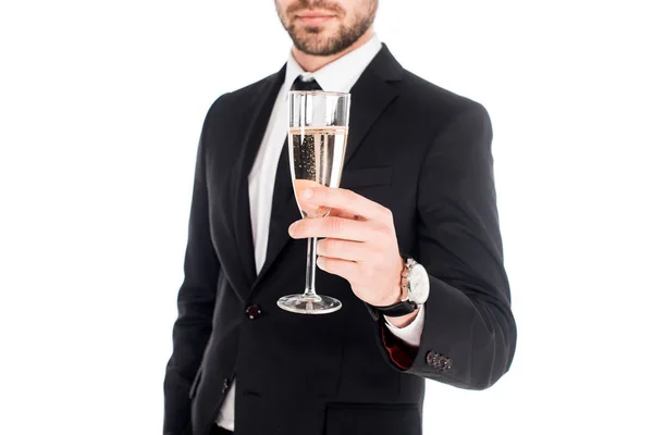Částečný Pohled Člověka Černém Kostýmu Drží Sklenku Šampaňského Izolované Bílém — Stock fotografie