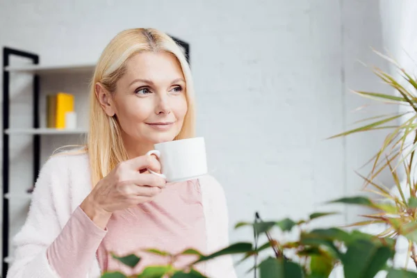 Beautiful Mature Blonde Woman Drinking Coffee Home — Stock Photo, Image