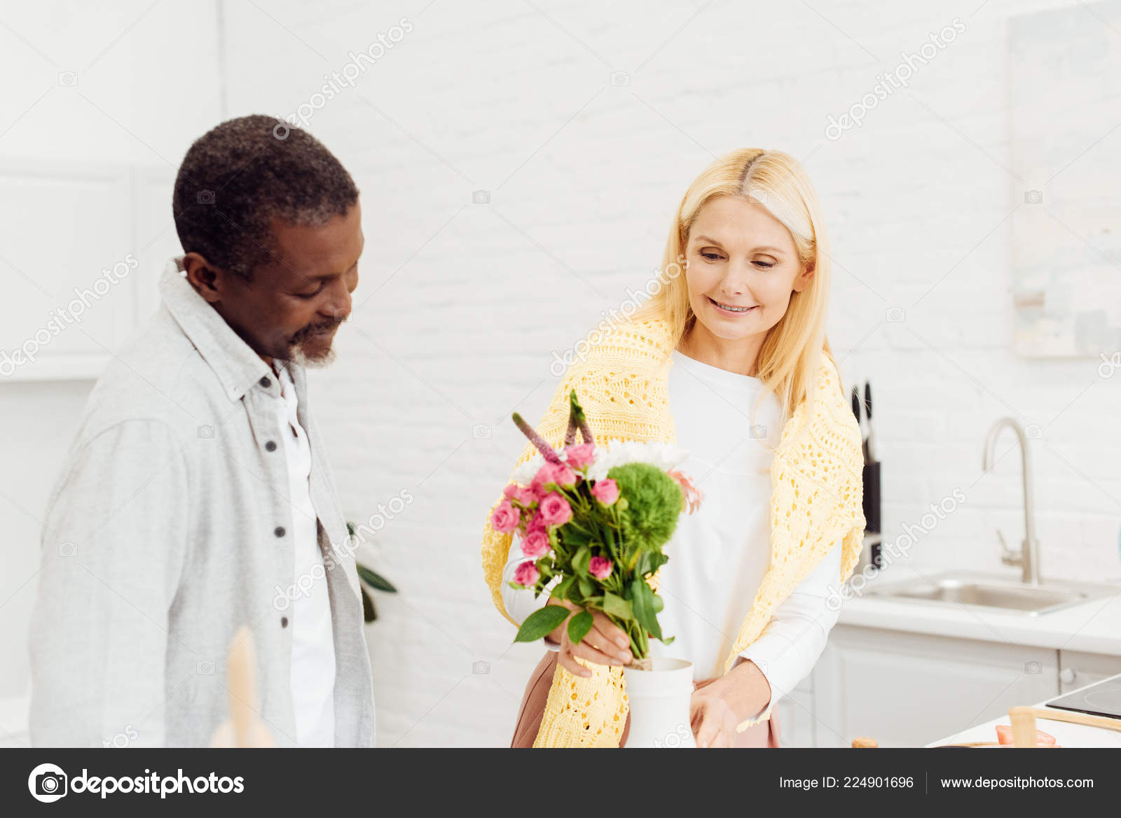 mature blonde black guy