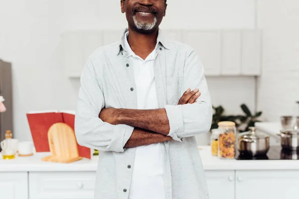 Cropped View African American Man Arms Crossed Standing Kitchen — Free Stock Photo