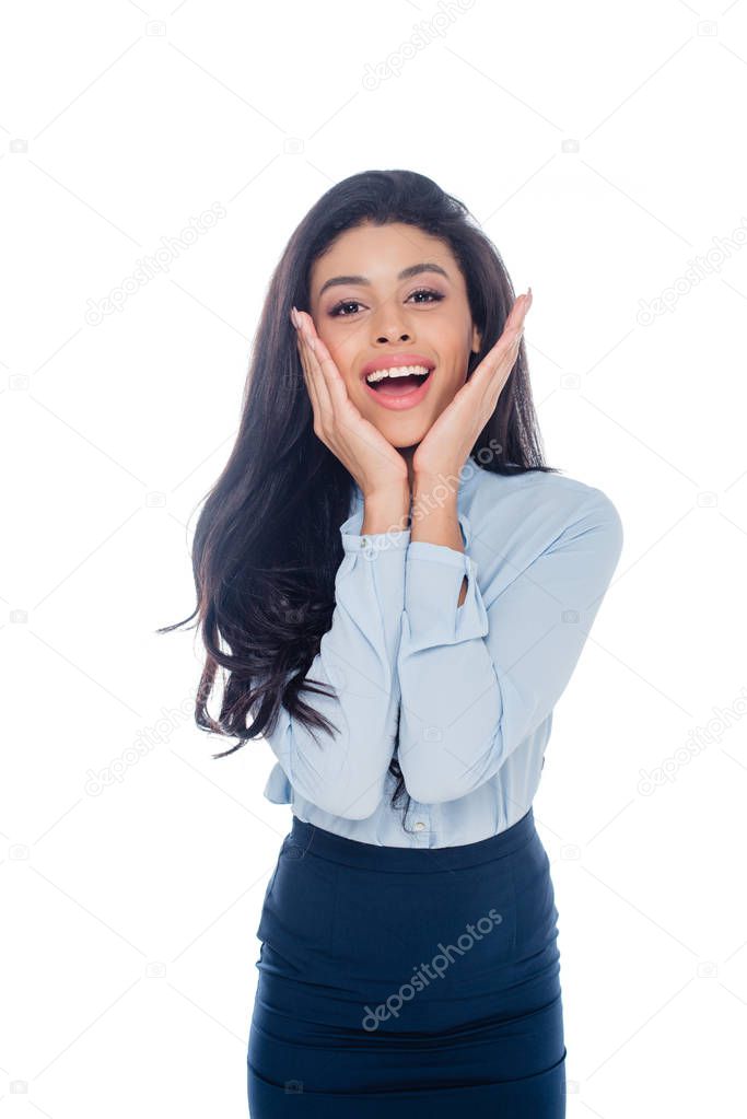 smiling african american young businesswoman posing with hands of face isolated on white