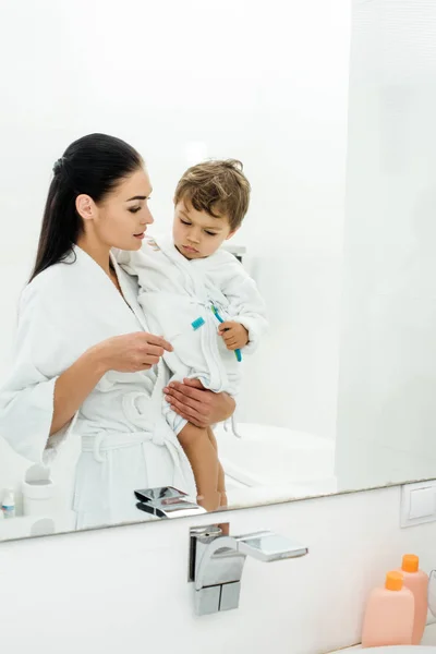 Mother Son White Bathrobes Brushing Teeth Together — Stock Photo, Image