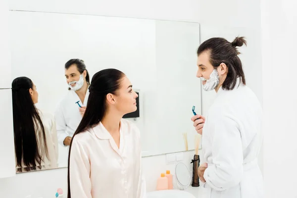 Handsome Man Shaving Front Mirror Talking Wife — Stock Photo, Image