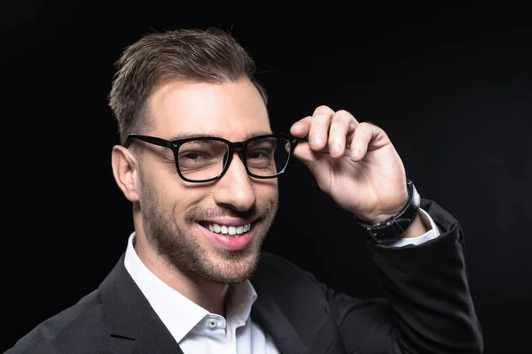 Close Portrait Handsome Young Businessman Eyeglasses Looking Camera Isolated Black — Free Stock Photo