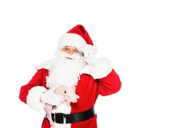 santa claus holding little pig in hand and looking up isolated on white clipart