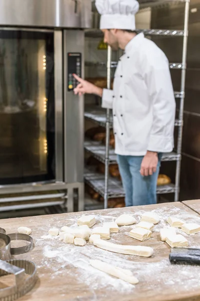 Male Cook Pushing Button Oven Bakehouse — Stock Photo, Image