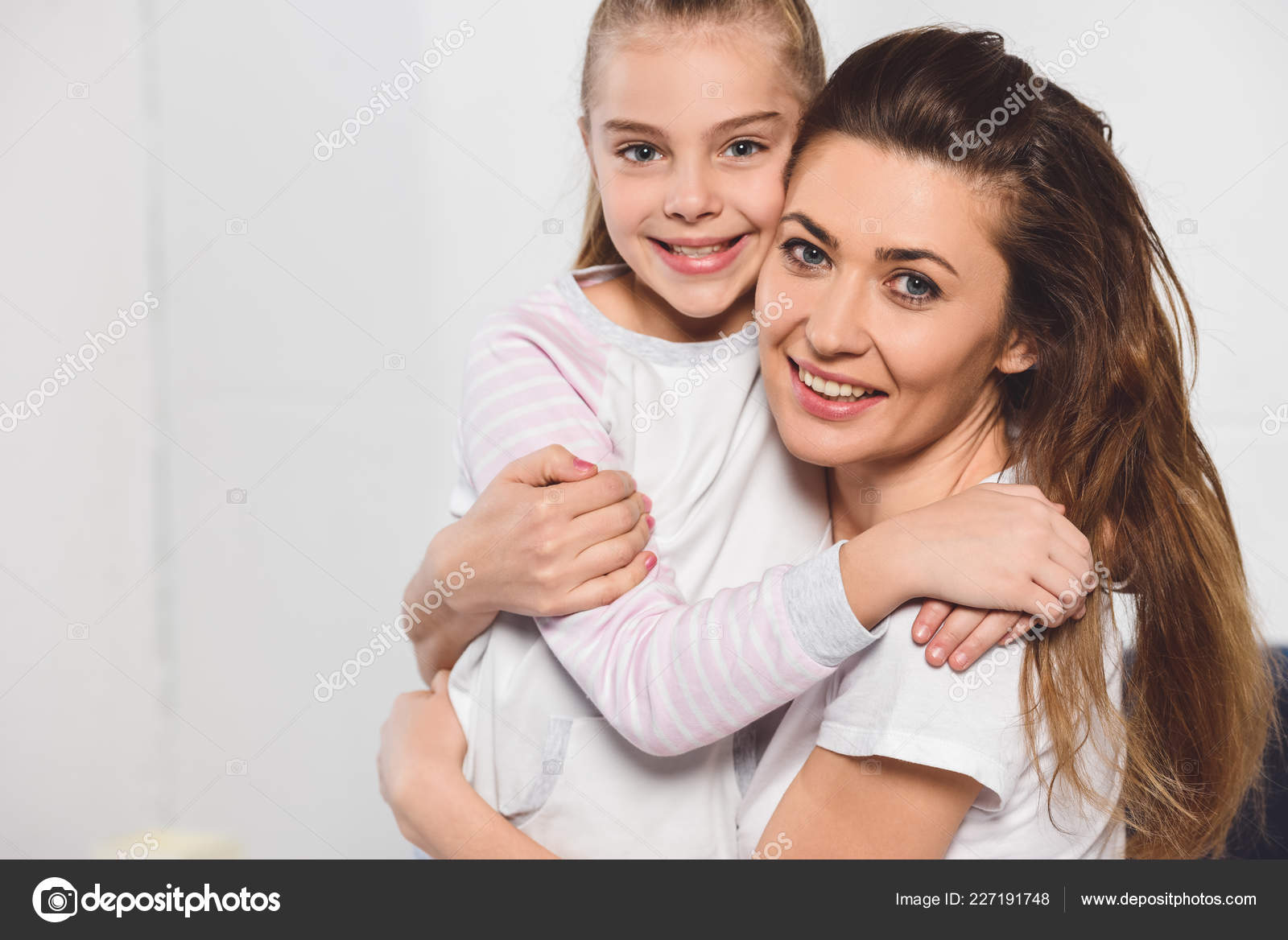 Mother And Daughter Hugging