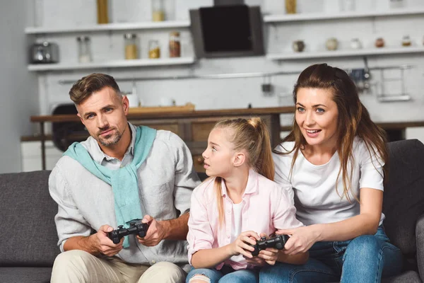 Cheerful Family Spending Time Together Playing Video Game Joysticks — Free Stock Photo