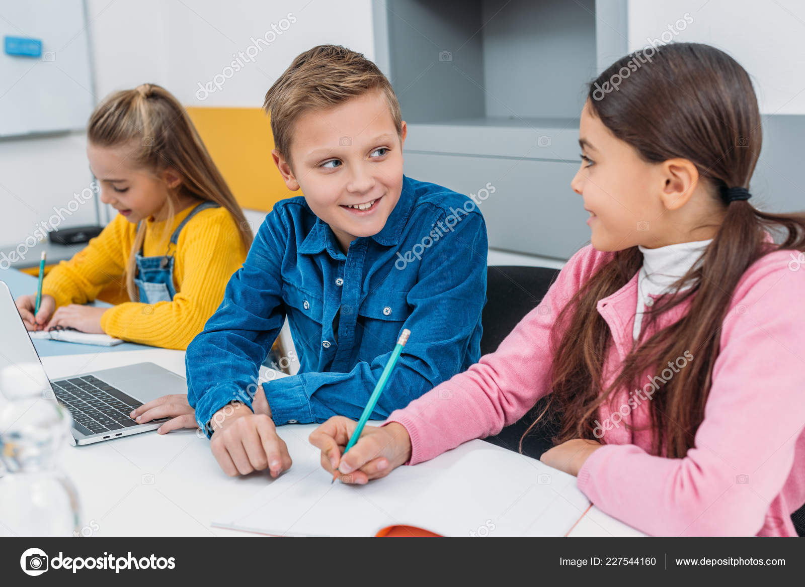 Smiling Children Sitting Desk Modern Classroom Stock Photo
