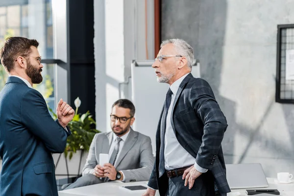 Side View Businessmen Talking While Standing Office — Stock Photo, Image