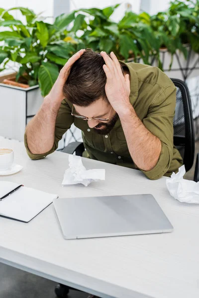 Sad Bearded Businessman Touching Head Sitting Table Crumpled Paper Office — Stock Photo, Image