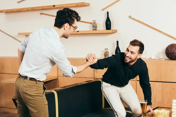 Smiling Friends Shaking Hands While Greeting Each Other Cafe — Stock Photo, Image