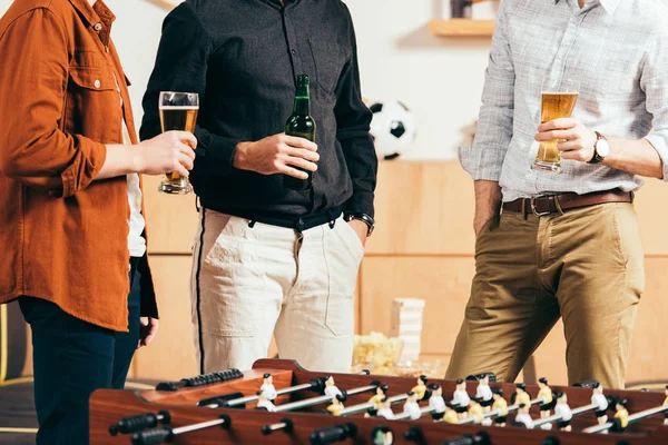 Cropped Shot Friends Beer Standing Table Soccer Cafe — Free Stock Photo