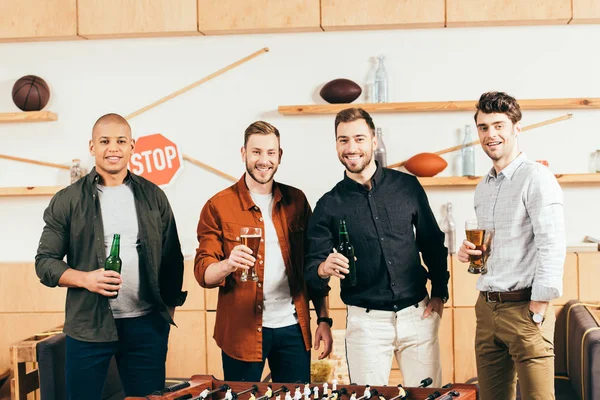 Portrait Smiling Multiracial Friends Beer Looking Camera Cafe — Free Stock Photo