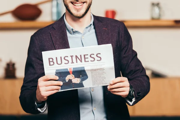 Partial View Cheerful Businessman Showing Newspaper Hands Cafe — Free Stock Photo