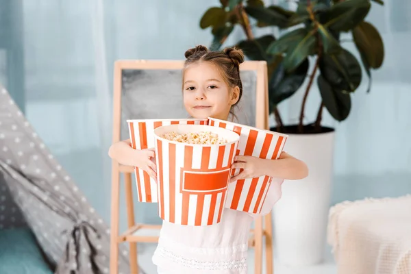 Cute Little Child Holding Boxes Popcorn Smiling Camera — Free Stock Photo