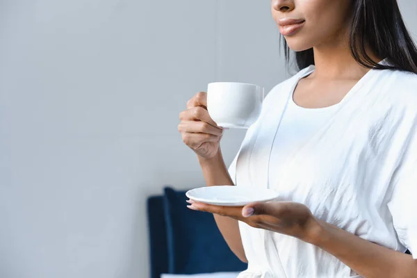 Cropped Image Mixed Race Girl White Robe Holding Cup Coffee — Free Stock Photo