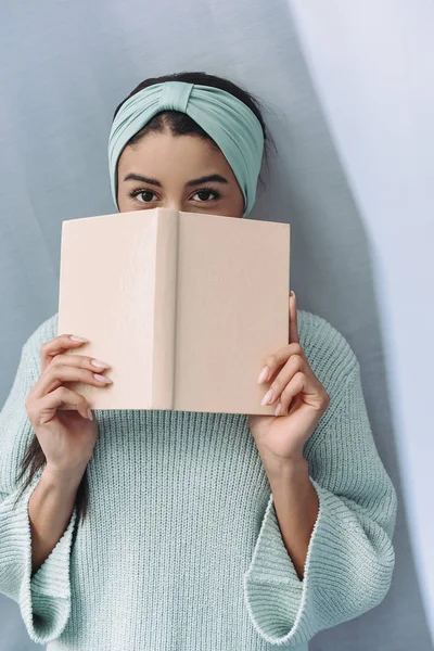 Beautiful Mixed Race Girl Turquoise Sweater Headband Looking Out Book — Stock Photo, Image