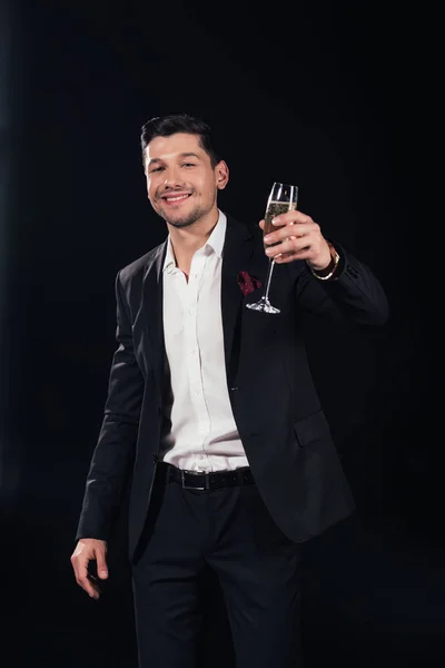 Smiling Handsome Man Looking Camera Raising Glass Champagne Isolated Black — Stock Photo, Image