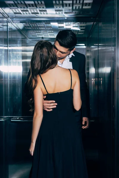 Young Couple Passionately Kissing Hugging Elevator — Stock Photo, Image