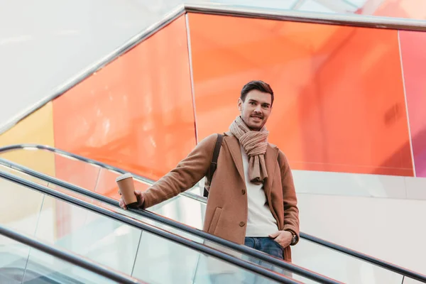 Handsome Man Paper Cup Smiling Looking Camera Escalator — Stock Photo, Image