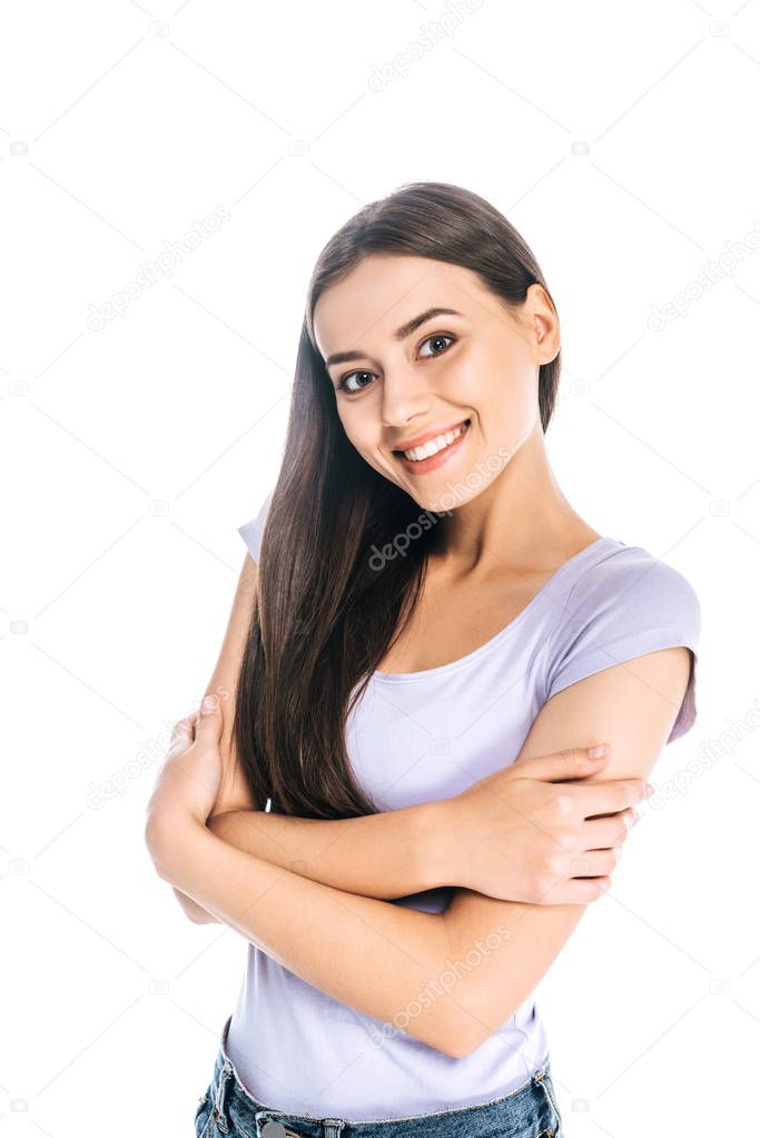 portrait of smiling pretty woman looking at camera isolated on white