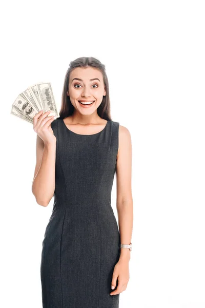 愉快的年轻女子在黑色礼服持有美元钞票孤立在白色 — 图库照片