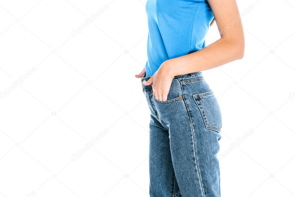 partial view of stylish woman in jeans isolated on white