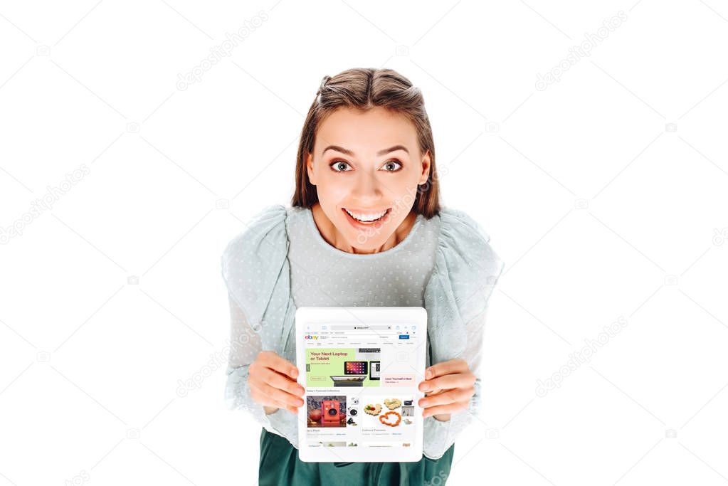 High angle view of smiling woman with tablet with ebay logo on screen isolated on white