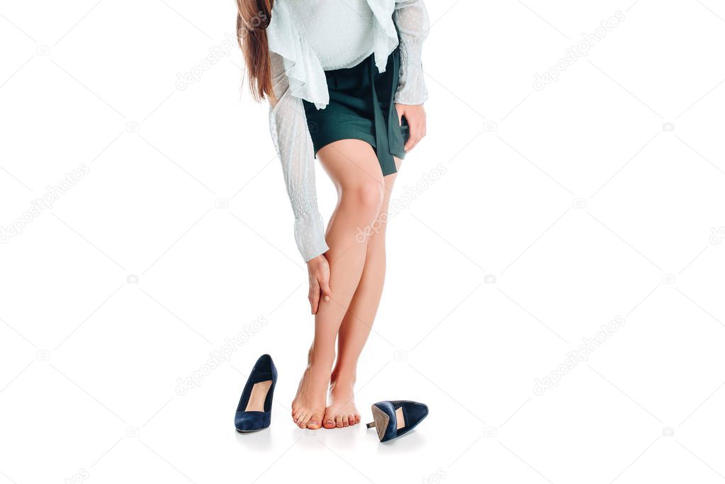 cropped shot of female legs isolated on white