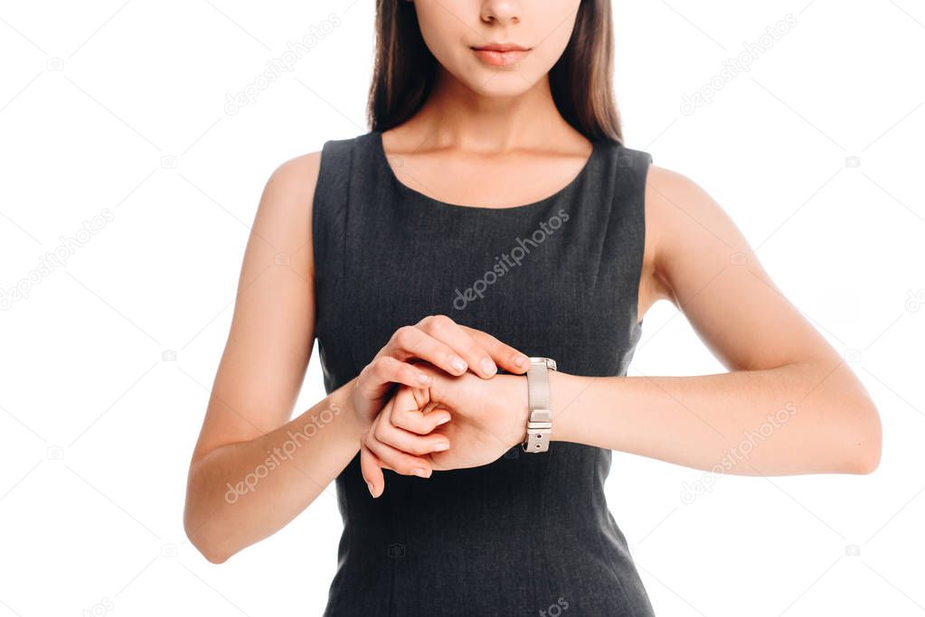 partial view of woman checking time isolated on white