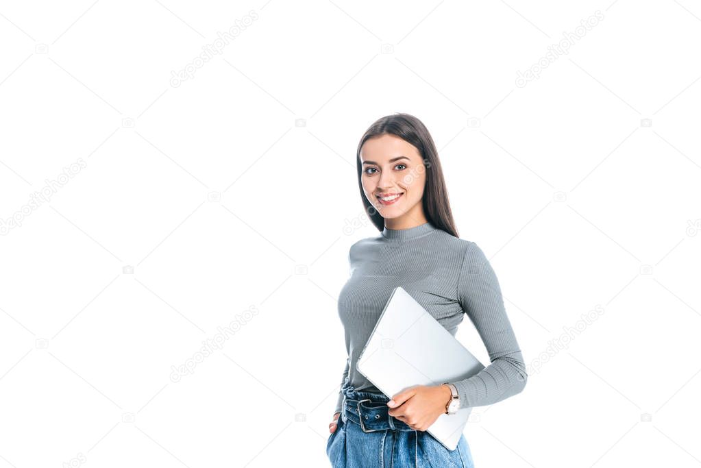portrait of young beautiful woman with laptop looking at camera isolated on white