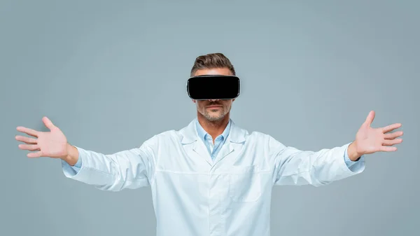 Scientist Virtual Reality Headset Holding Something Air Isolated Grey Artificial — Stock Photo, Image