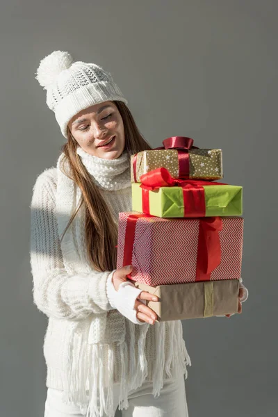 Attractive Woman Trendy Winter Sweater Scarf Holding Presents Isolated Grey — Stock Photo, Image