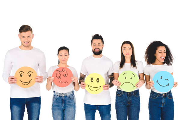 multicultural friends with different multicolored signs looking at camera isolated on white