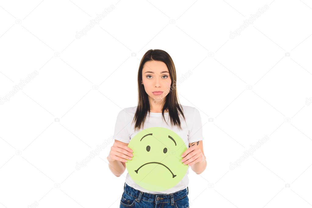 attractive girl holding sign with unhappy face expression isolated on white