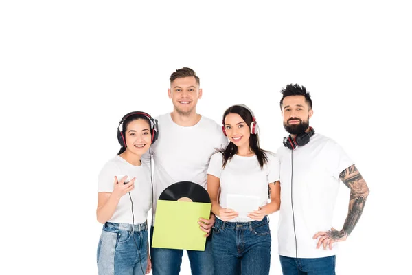 young people in headphones holding vinyl record and gadgets isolated on white