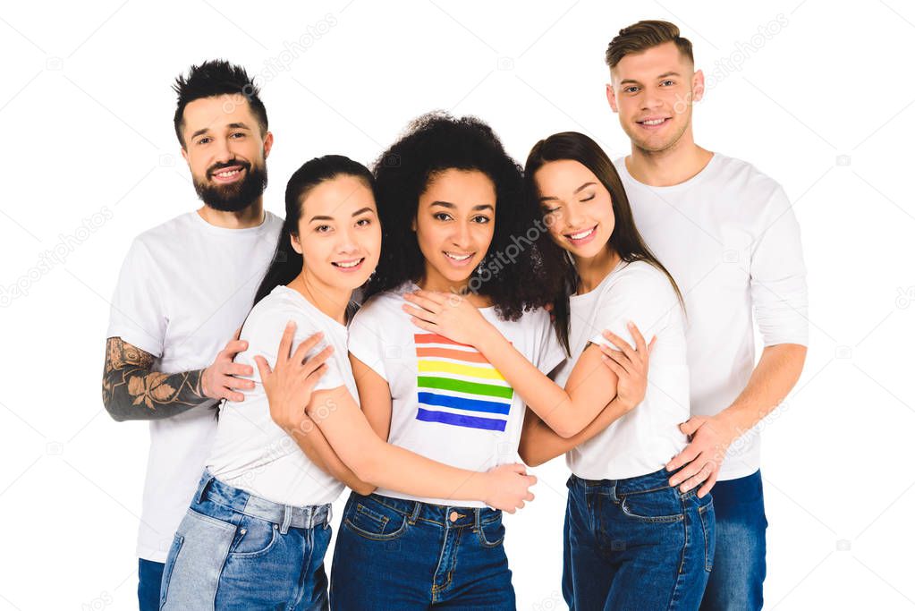 multiethnic group of young people smiling and hugging with african american woman with lgbt sign on t-shirt isolated on white