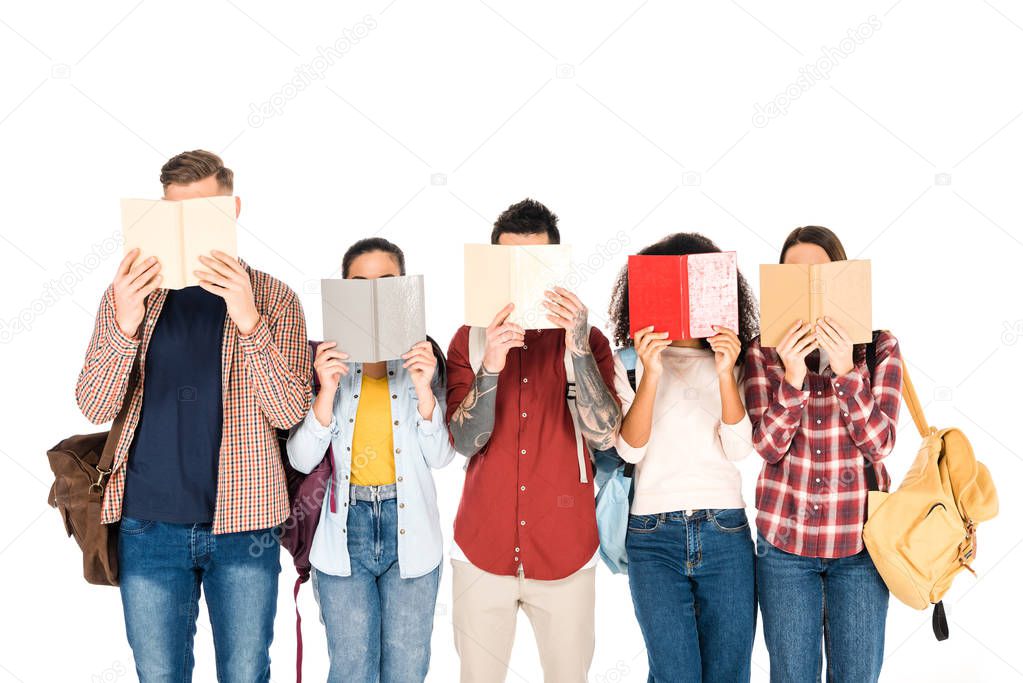 group of young people reading books and holding backpacks isolated on white