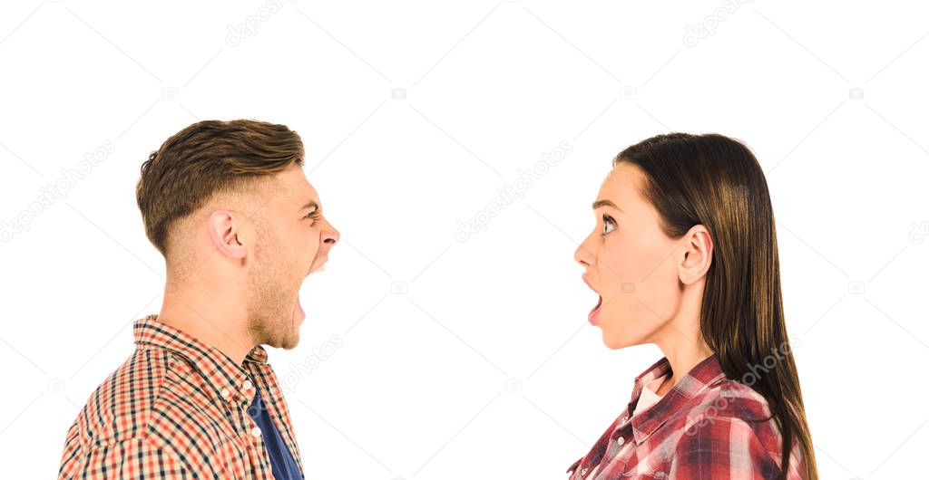 profile of surprised girl and screaming man  isolated on white
