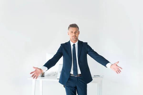 Handsome Businessman Standing Open Arms Table Computer Isolated White — Stock Photo, Image