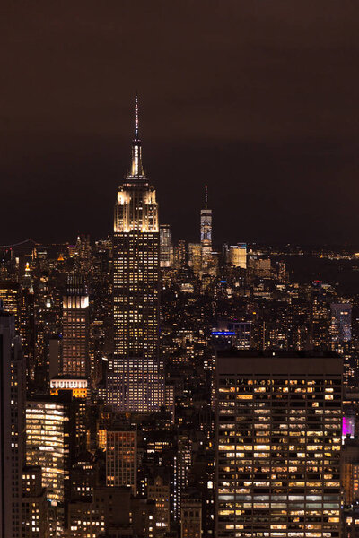 Aerial view of buildings and night city lights in new york, usa