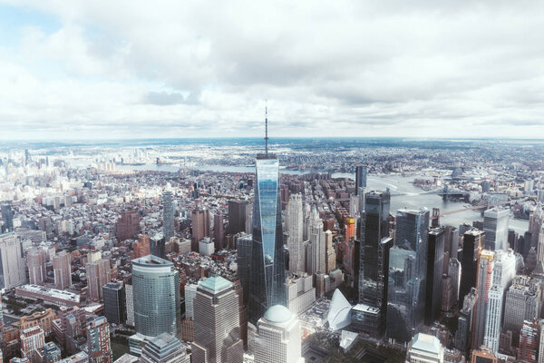 Aerial view of new york city skyscrapers and cloudy sky, usa