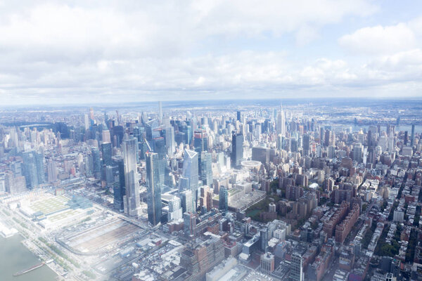 aerial view of new york city skyscrapers and cloudy sky, usa