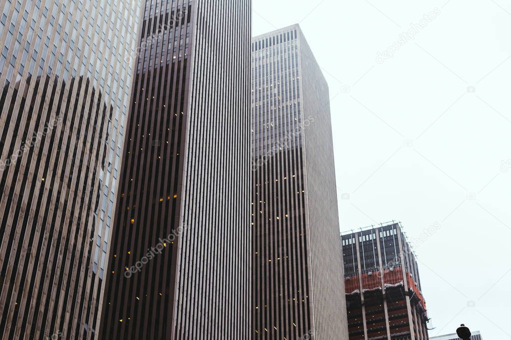 urban scene with architecture of new york city and clear sky, usa