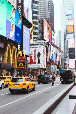 TIMES SQUARE, NEW YORK, USA - OCTOBER 8, 2018: urban scene with crowded times square in new york, usa clipart