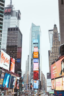 TIMES SQUARE, NEW YORK, USA - OCTOBER 8, 2018: skyscrapers and billboards on times square in new york, usa clipart